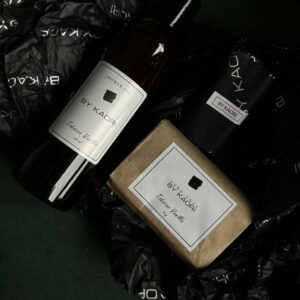 Elegant packaging of skincare products displayed with chic, branded wrapping.