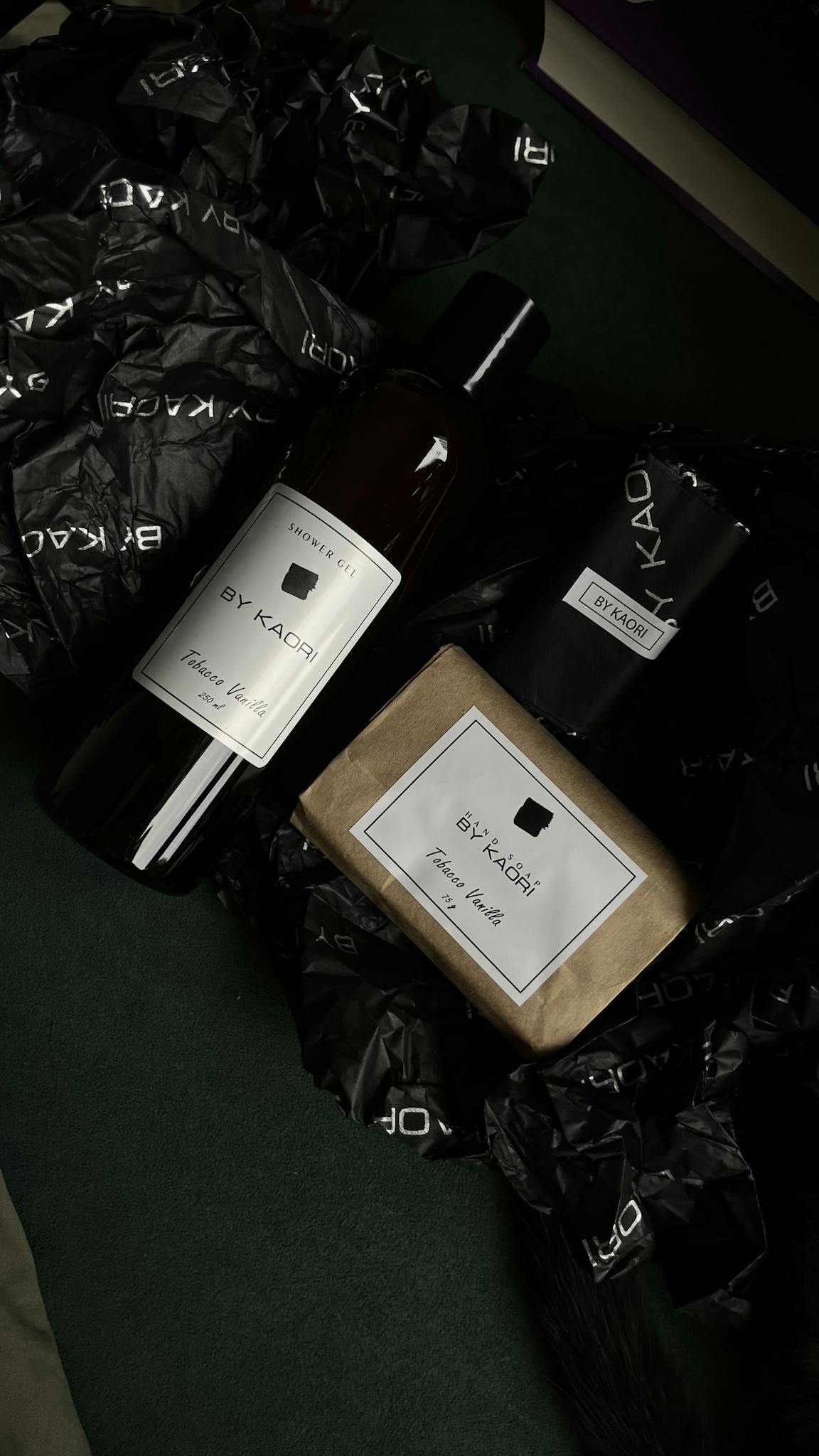 Elegant packaging of skincare products displayed with chic, branded wrapping.